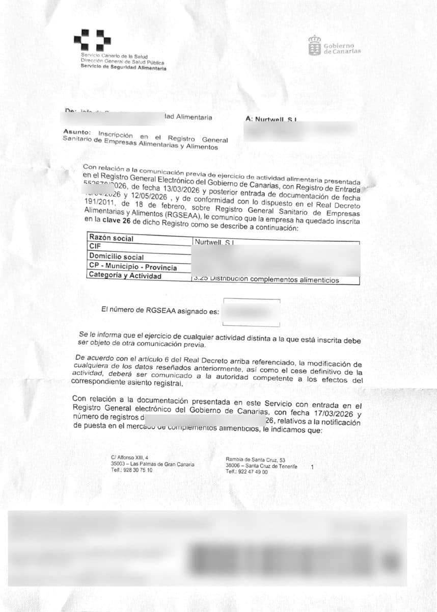 Documento del registro sanitario de NURT, con los datos desenfocados