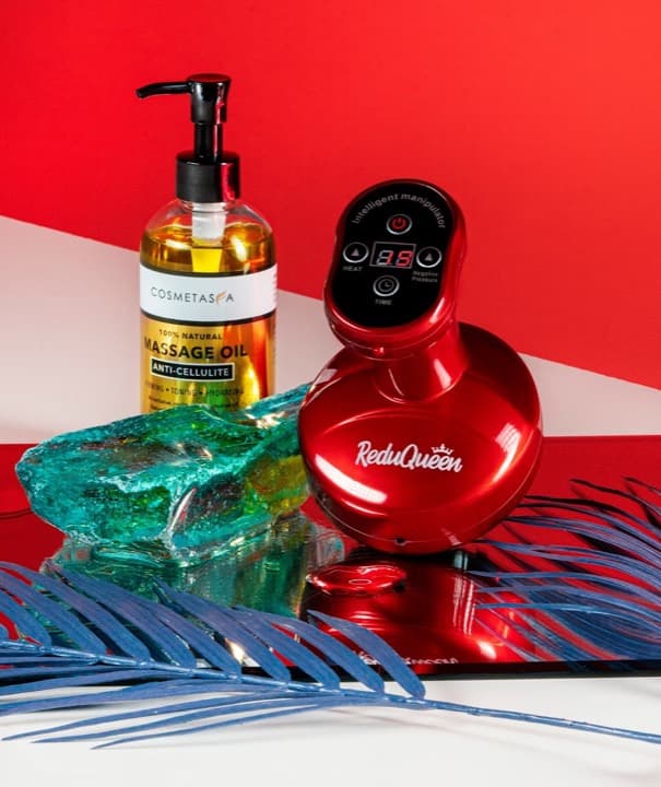 Masajeador rojo y aceite de masaje de Reduqueen